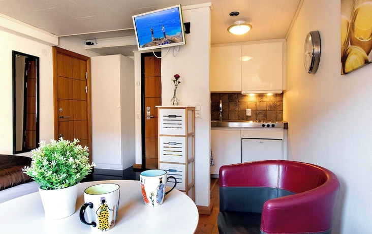 Imagen de la habitación del Hotel CityApartment. Foto 8
