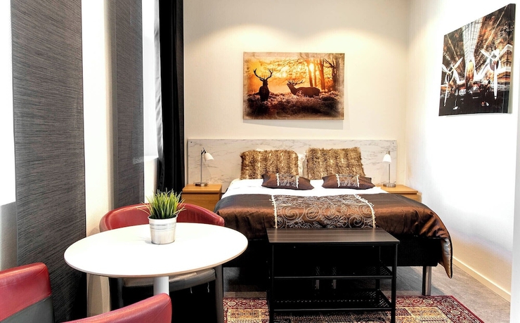 Imagen de la habitación del Hotel CityApartment. Foto 10