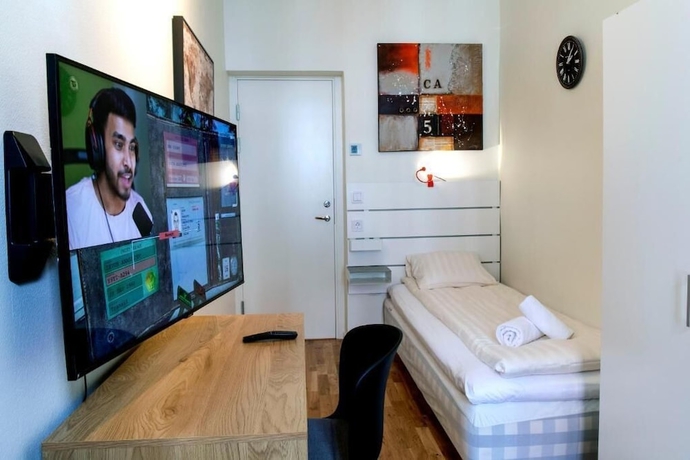 Imagen de la habitación del Hotel CityApartment. Foto 11