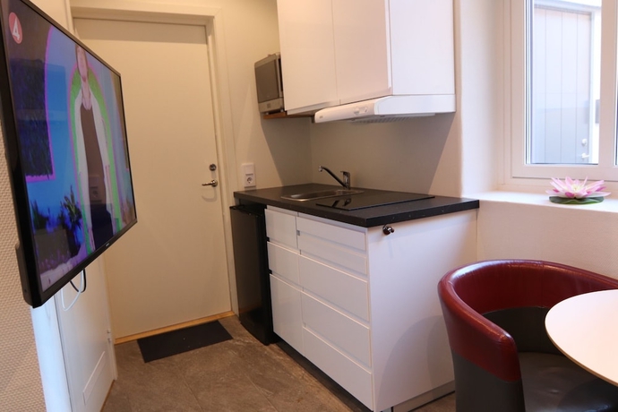 Imagen de la habitación del Hotel CityApartment. Foto 12