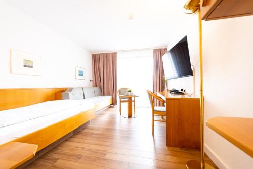 Imagen de la habitación del Hotel CityHotel Feuerbach. Foto 8