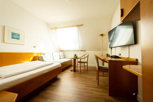 Imagen de la habitación del Hotel CityHotel Feuerbach. Foto 10