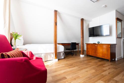 Imagen de la habitación del Hotel CityHotel Feuerbach. Foto 13