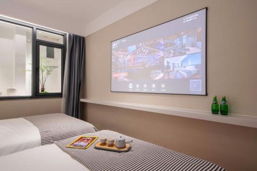 Imagen de la habitación del Hotel CityNote希诺酒店(广州北京路步行街新大新店). Foto 19