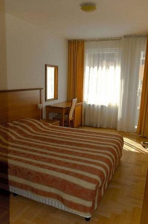 Imagen de la habitación del Hotel CityResidence Aparthotel. Foto 2