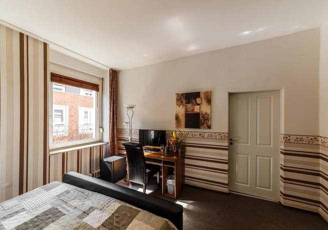 Imagen de la habitación del Hotel CityStolberg. Foto 14