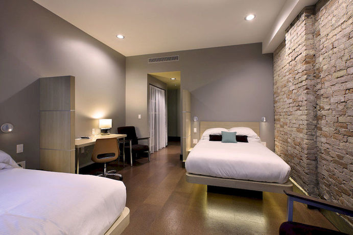 Imagen de la habitación del Hotel Cityflatshotel Grand Rapids. Foto 3