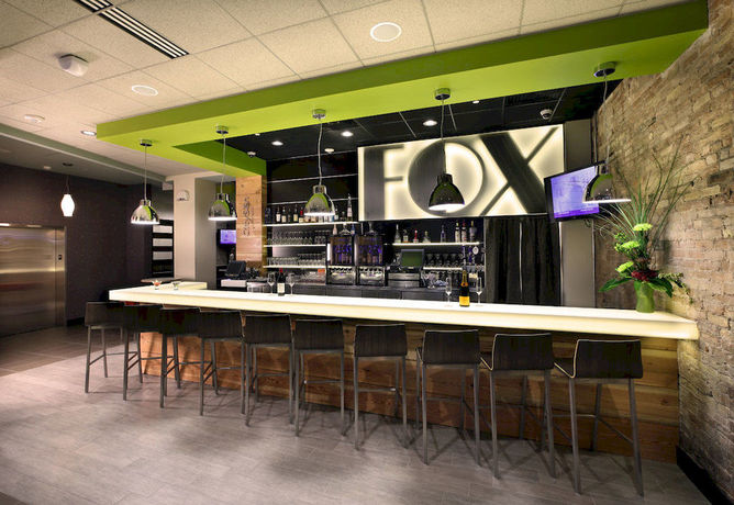 Imagen de la habitación del Hotel Cityflatshotel Grand Rapids. Foto 6