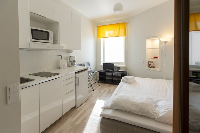 Imagen de la habitación del Hotel Citykoti Downtown Apartments. Foto 7