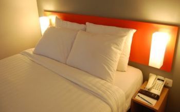 Imagen de la habitación del Hotel Cityone Xpress Semarang. Foto 2