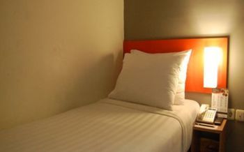 Imagen de la habitación del Hotel Cityone Xpress Semarang. Foto 3
