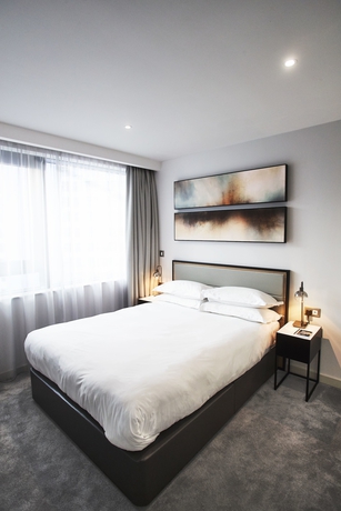 Imagen de la habitación del Hotel Citysuites. Foto 9