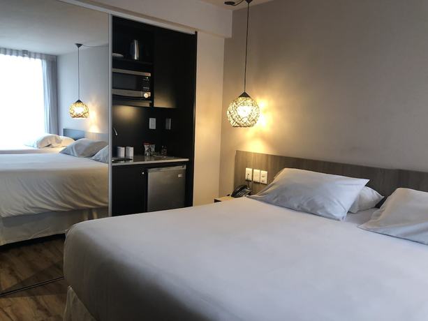 Imagen de la habitación del Hotel Ciudadano Suites. Foto 7