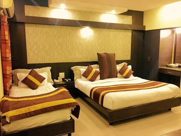 Imagen de la habitación del Hotel Cj International. Foto 13