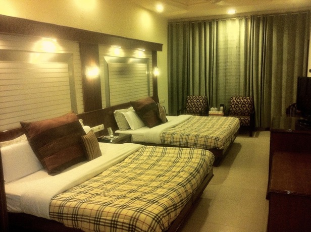Imagen de la habitación del Hotel Cj International. Foto 16