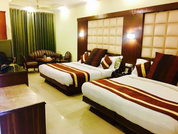 Imagen de la habitación del Hotel Cj International. Foto 18