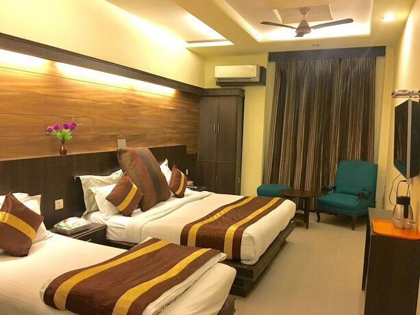 Imagen de la habitación del Hotel Cj International. Foto 21