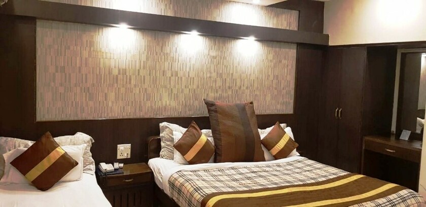Imagen de la habitación del Hotel Cj International. Foto 23