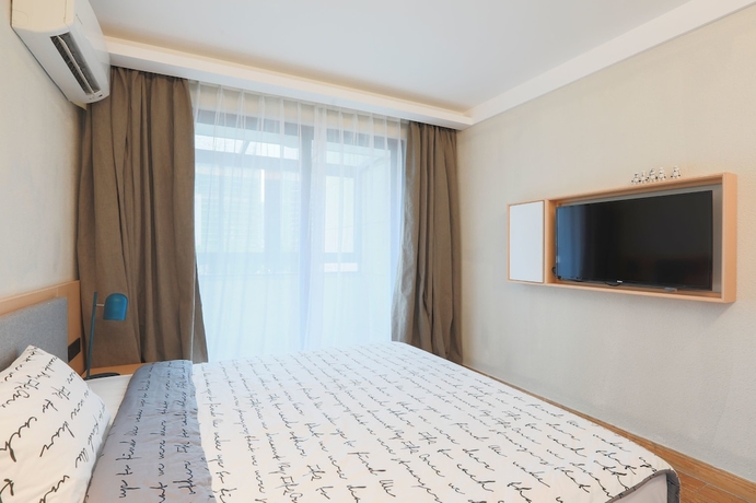 Imagen de la habitación del Hotel Cjia Service Apartment. Foto 4