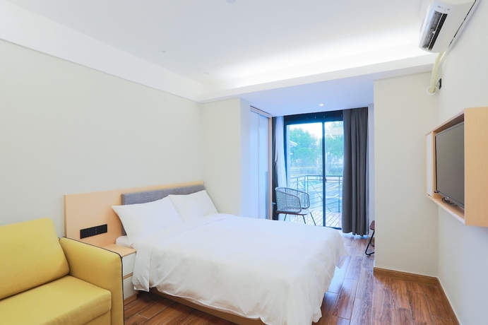 Imagen de la habitación del Hotel Cjia Service Apartment. Foto 6