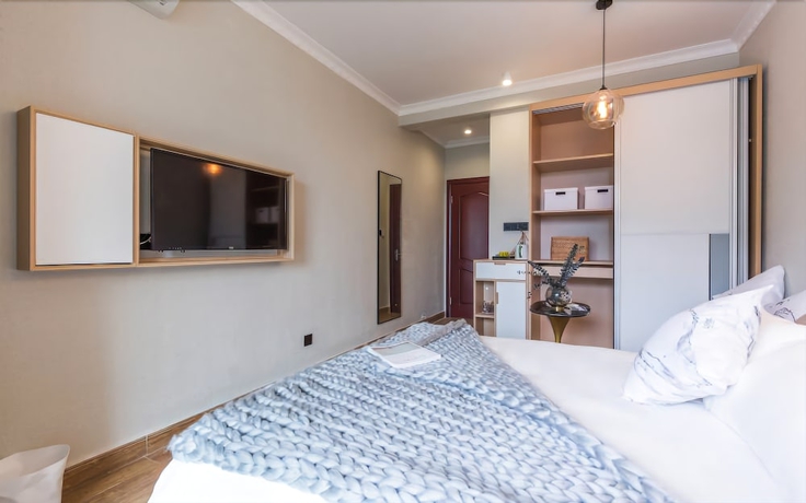 Imagen de la habitación del Hotel Cjia Service Apartment. Foto 10