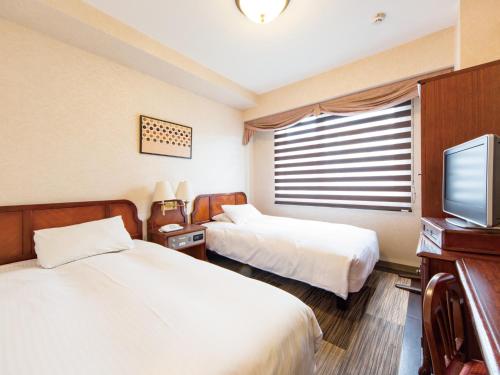 Imagen de la habitación del Hotel Claiton Shin-osaka. Foto 6