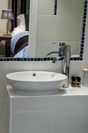 Imagen de la habitación del Hotel Clarence Court. Foto 15