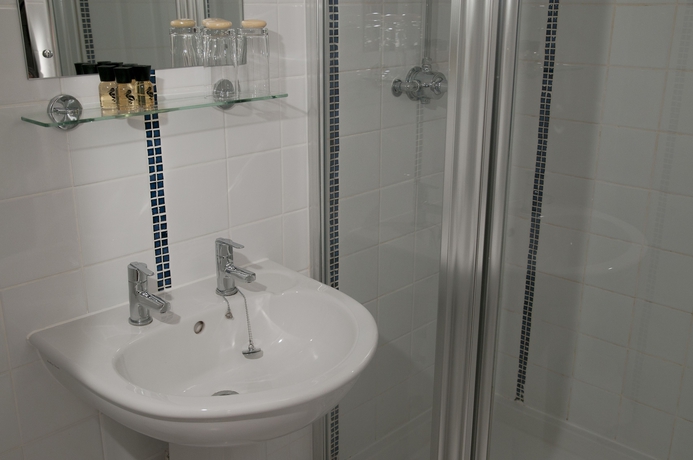 Imagen de la habitación del Hotel Clarence Court. Foto 16