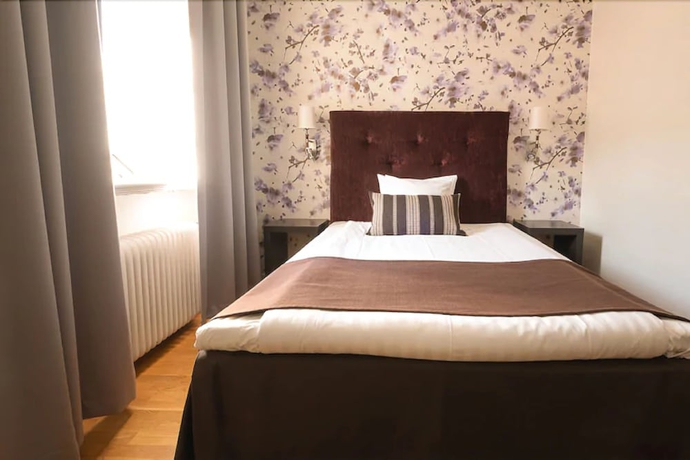 Imagen de la habitación del Hotel Clarion Collection Grand. Foto 7