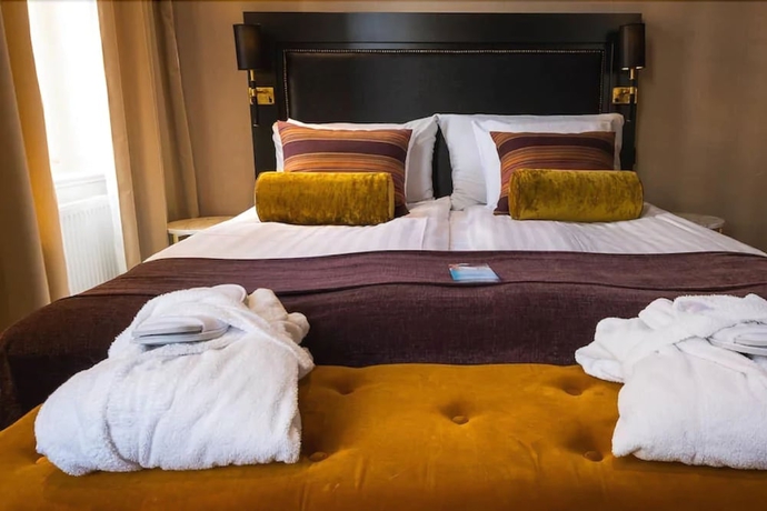 Imagen de la habitación del Hotel Clarion Collection Grand. Foto 11