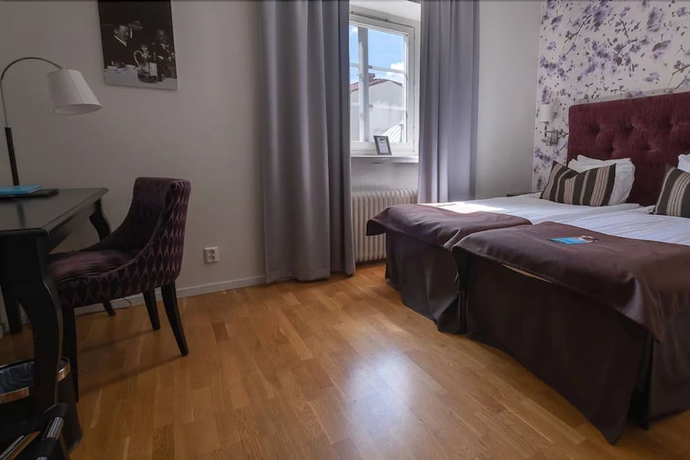 Imagen de la habitación del Hotel Clarion Collection Grand. Foto 13