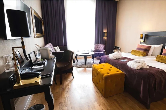 Imagen de la habitación del Hotel Clarion Collection Grand. Foto 17