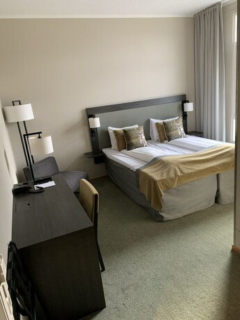 Imagen de la habitación del Hotel Clarion Collection Helma. Foto 12