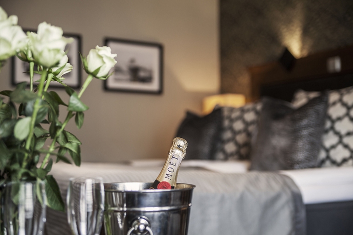 Imagen de la habitación del Hotel Clarion Grand. Foto 4