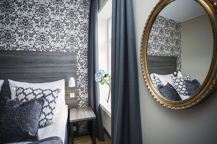 Imagen de la habitación del Hotel Clarion Grand. Foto 7