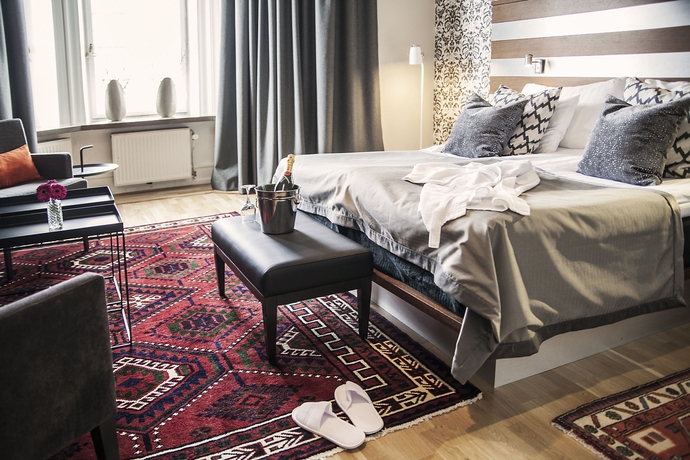 Imagen de la habitación del Hotel Clarion Grand. Foto 9