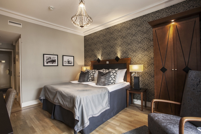 Imagen de la habitación del Hotel Clarion Grand. Foto 10