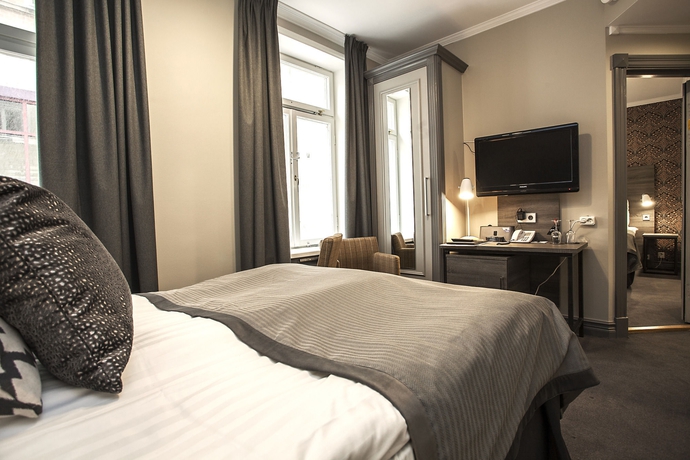 Imagen de la habitación del Hotel Clarion Grand. Foto 11