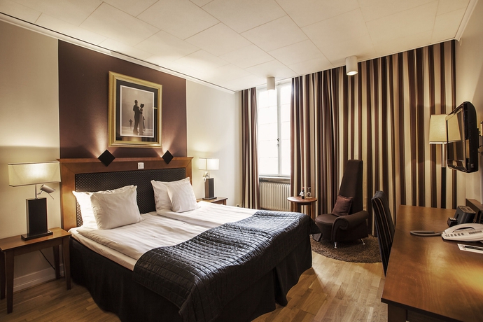 Imagen de la habitación del Hotel Clarion Grand. Foto 16