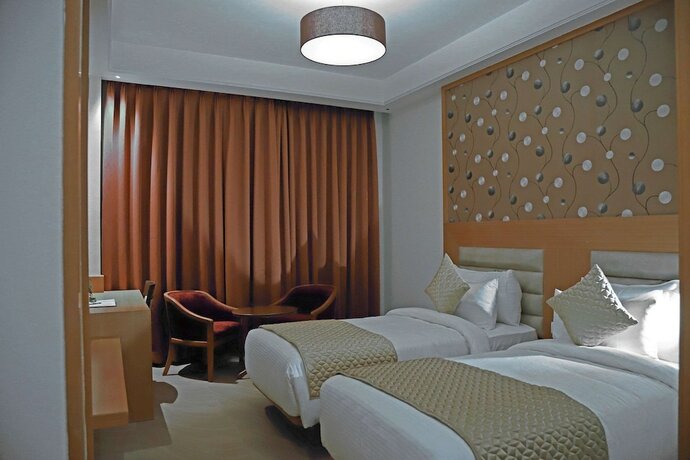 Imagen de la habitación del Hotel Clarion Inn Indore. Foto 15