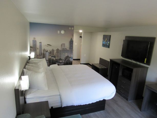 Imagen de la habitación del Hotel Clarion Pointe Mcdonough. Foto 4