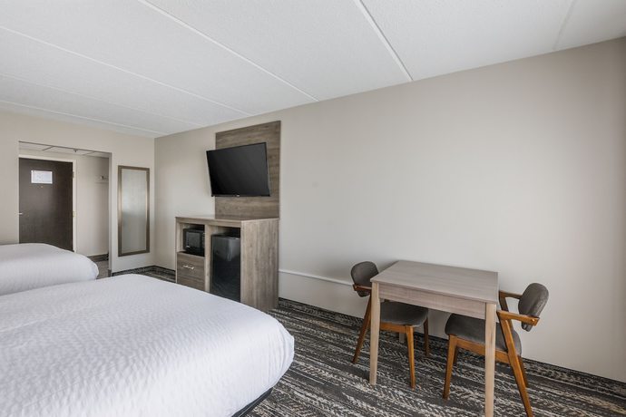 Imagen de la habitación del Hotel Clarion Pointe Near University. Foto 11