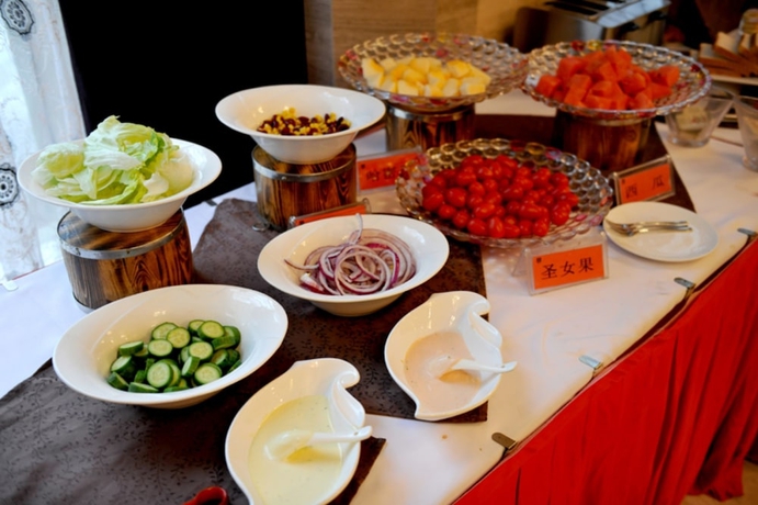 Imagen del bar/restaurante del Hotel Clarion Resort Leishan Hot Spring Resort. Foto 8