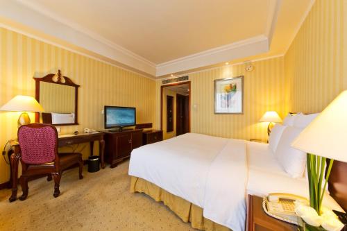 Imagen de la habitación del Hotel Clarion Tianjin. Foto 5