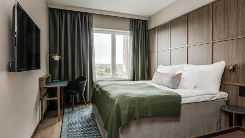 Imagen de la habitación del Hotel Clarion Ume&aring;. Foto 18