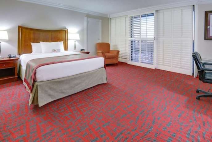 Imagen de la habitación del Hotel Clarion & Suites Metairie. Foto 1