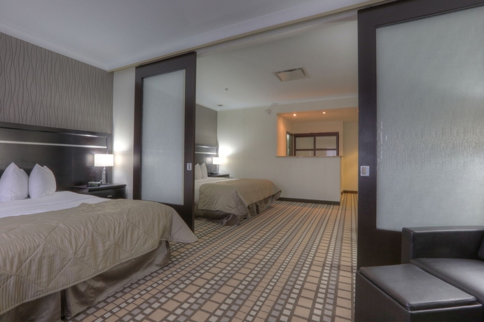 Imagen de la habitación del Hotel Clarion and Suites. Foto 4