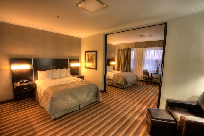Imagen de la habitación del Hotel Clarion and Suites. Foto 7
