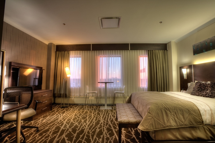 Imagen de la habitación del Hotel Clarion and Suites. Foto 9