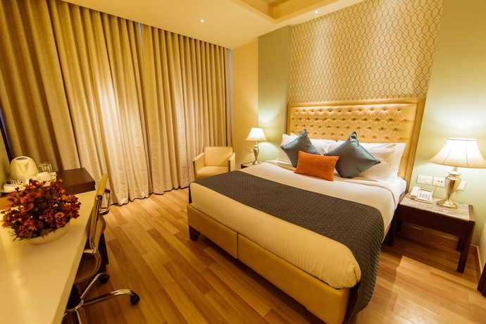 Imagen de la habitación del Hotel Clark International. Foto 2
